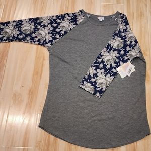 LulaRoe Randy Gray body, white/gray flowers on sleeves with blue background.